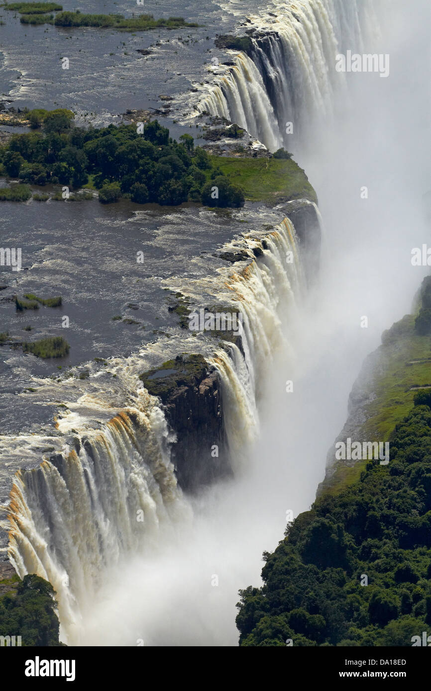 Victoria Falls or 'Mosi-oa-Tunya' (The Smoke that Thunders), and Zambezi River, Zimbabwe / Zambia border, Southern Africa Stock Photo