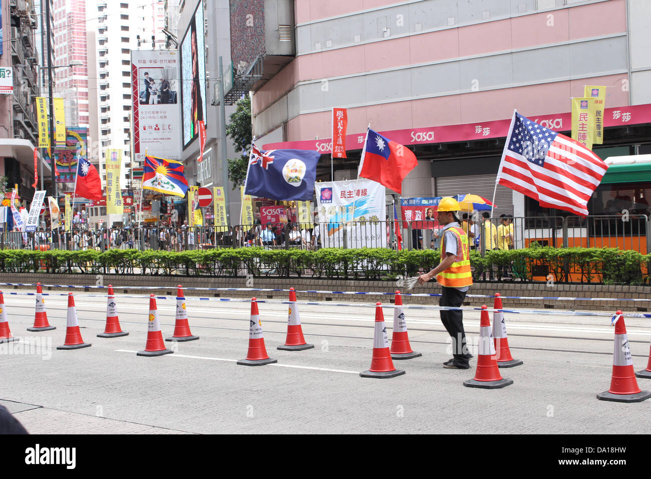 Hong Kong. 1st July 2013. The flags of nationalist China/Taiwan, Tibet, colonial Hong Kong and the USA line the route of the July 1, 2013 pro-democracy march Credit:  Robert SC Kemp/Alamy Live News Stock Photo