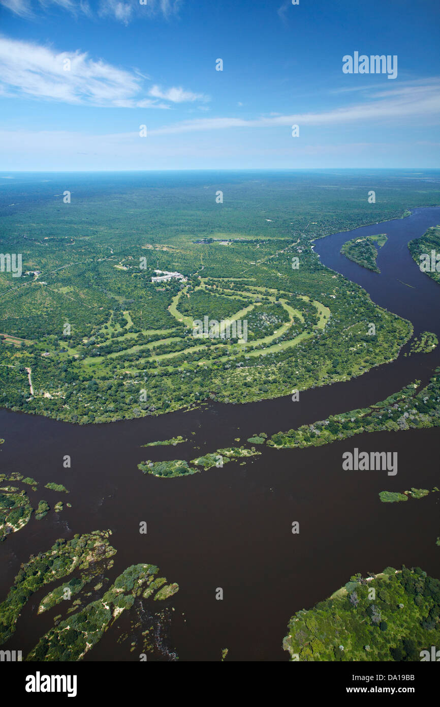 Golf Course, Elephant Hills Resort, and Zambezi River, just above Victoria Falls, Zimbabwe, Southern Africa - aerial Stock Photo