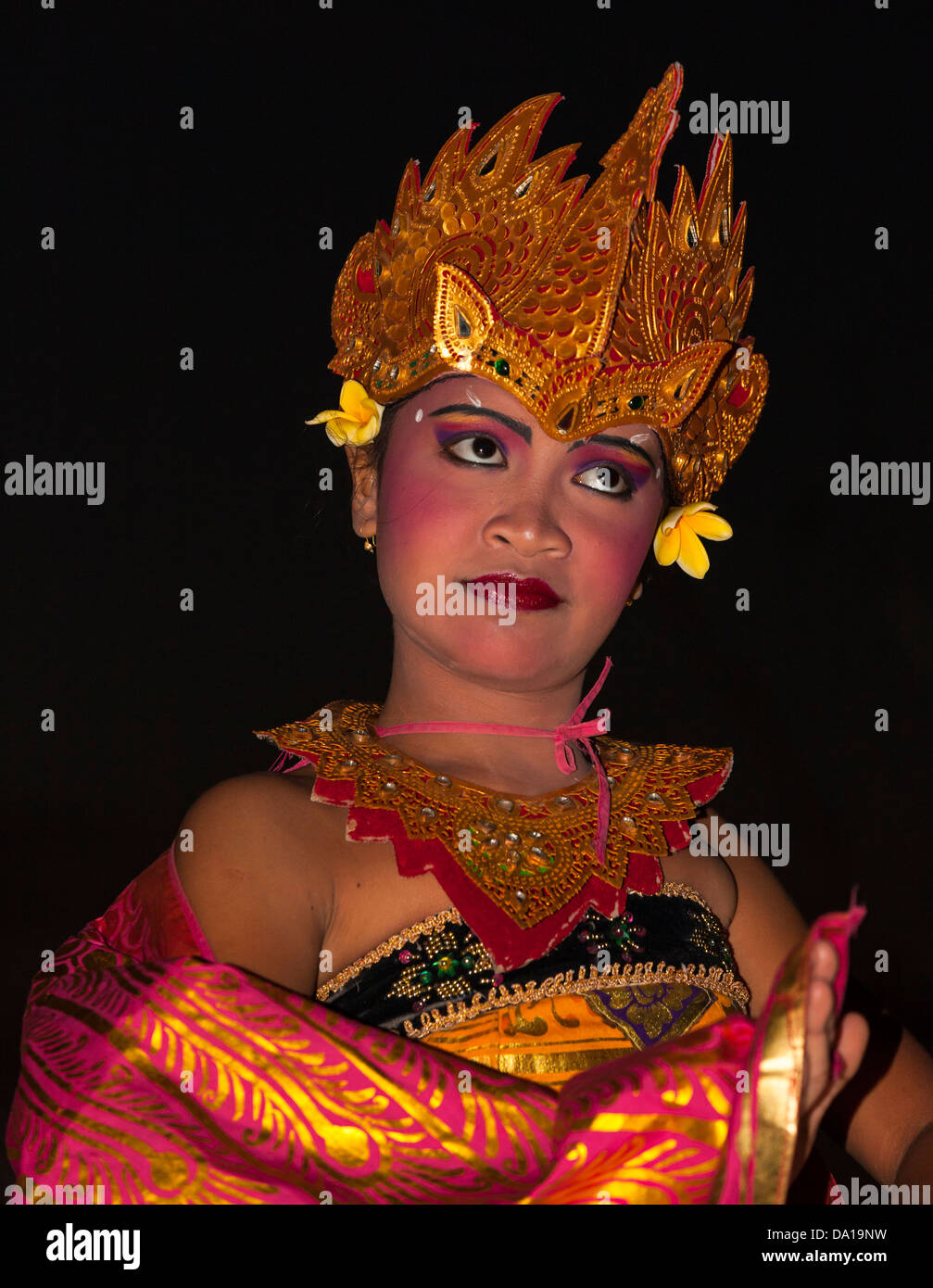 Indonesia, Balinese dancer in traditional dress dancing Stock Photo