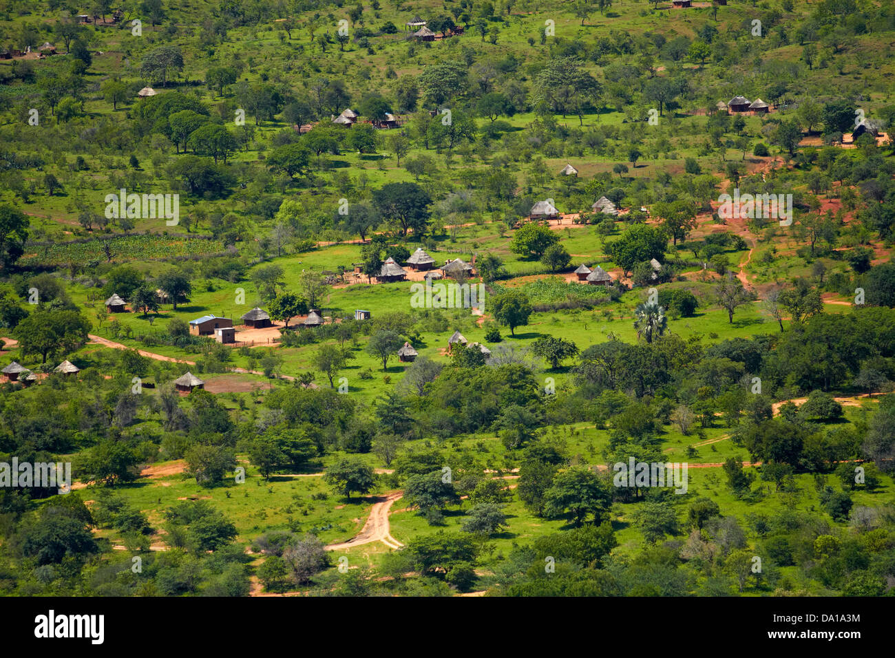 Traditional African village near Victoria Falls, Zimbabwe, Africa - aerial Stock Photo