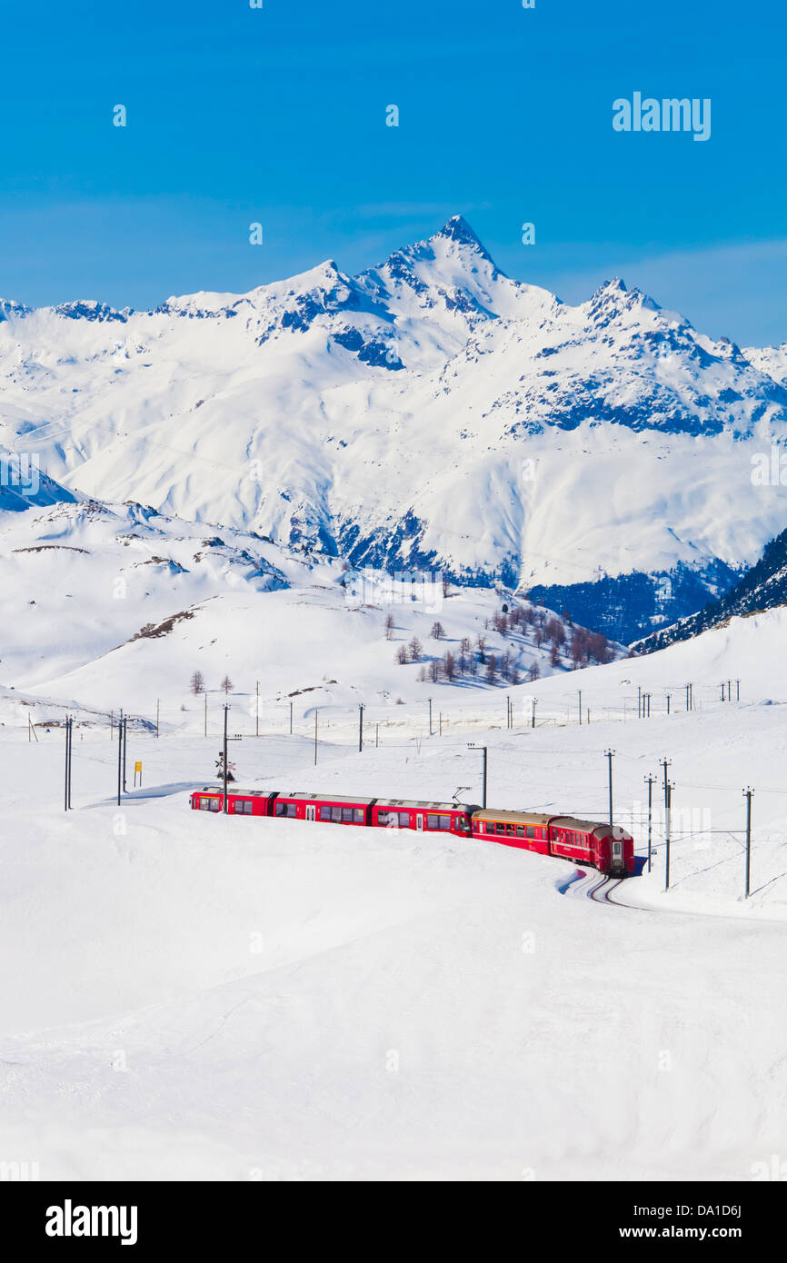 Switzerland, Rhaetian railway passing through snow Stock Photo - Alamy