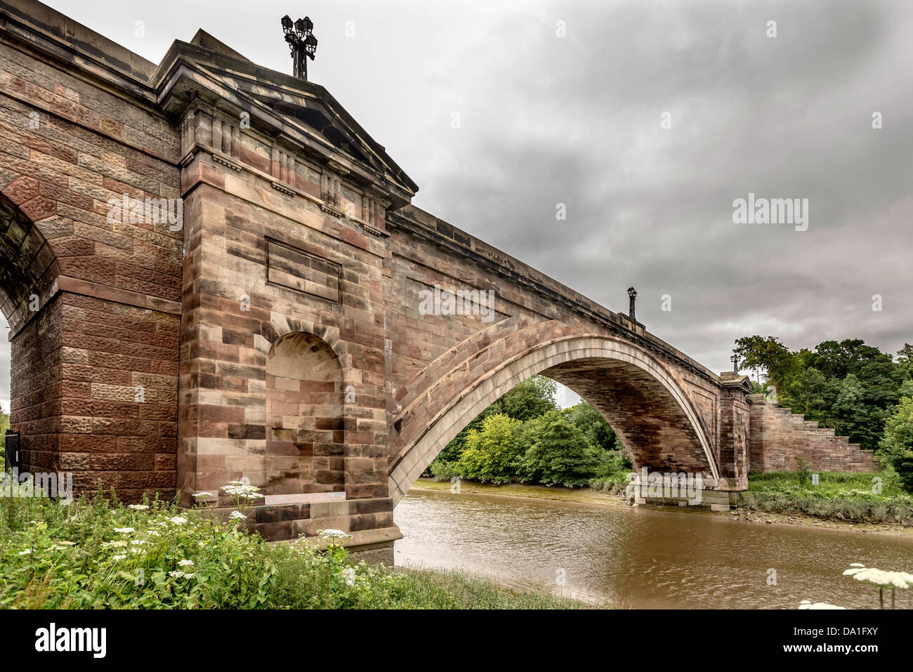 The Grosvenor Bridge, a single-span stone arch road bridge crossing the River Dee at Chester, England. Stock Photo