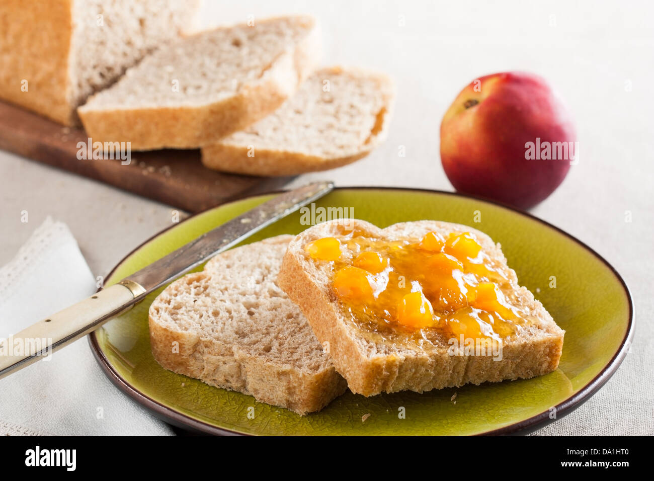 Bread toast with peach jam Stock Photo Alamy
