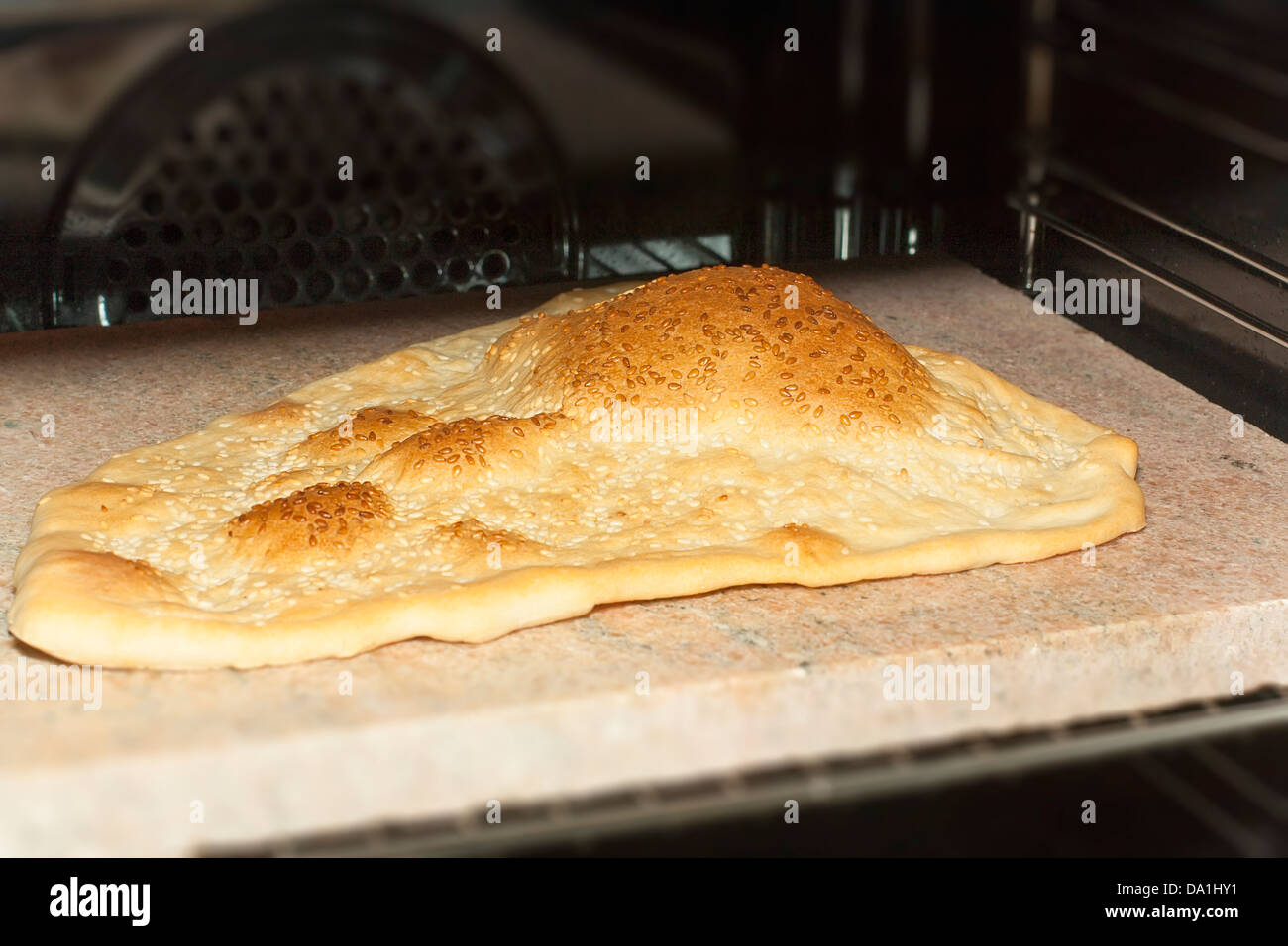 Eastern bread baking in oven on a stone Stock Photo Alamy