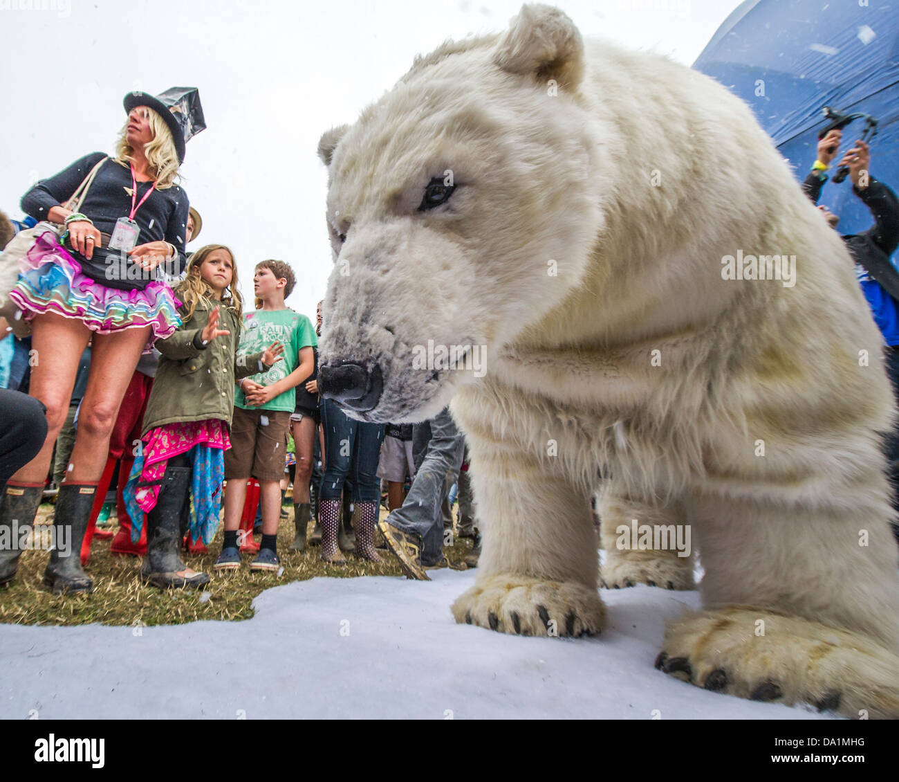A Greenpeace campaign to save the Artic involves a snowball fight with real  snow and a lifesize polar bear Stock Photo - Alamy