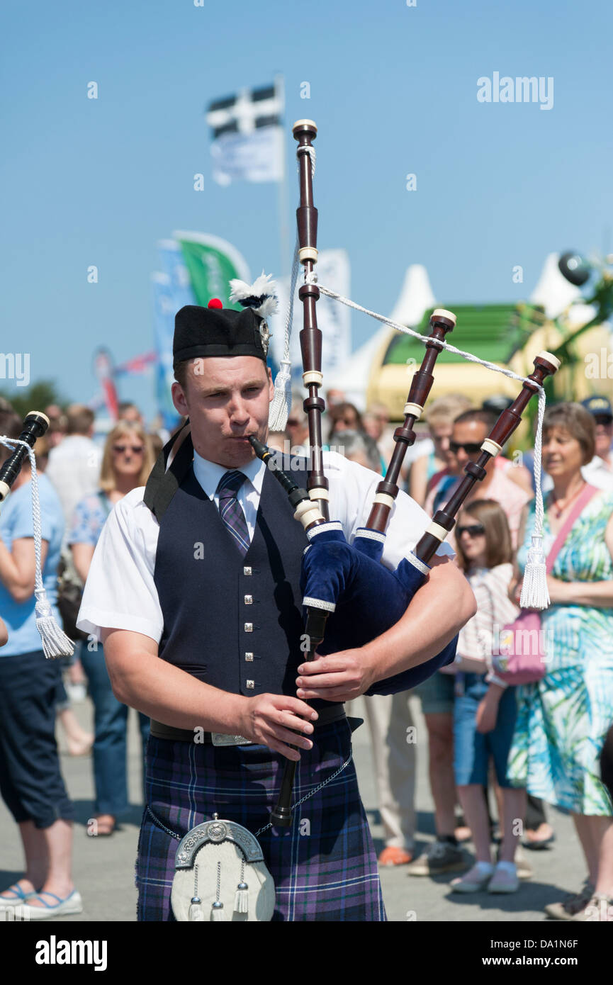 Man playing the bagpipes at the Royal Cornwall Show UK Stock Photo