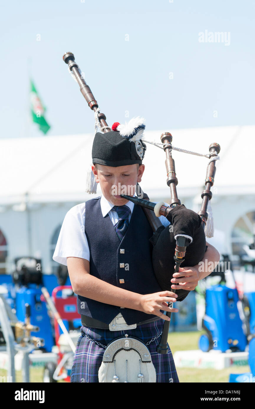 Boy playing the bagpipes at the Royal Cornwall Show UK Stock Photo Alamy