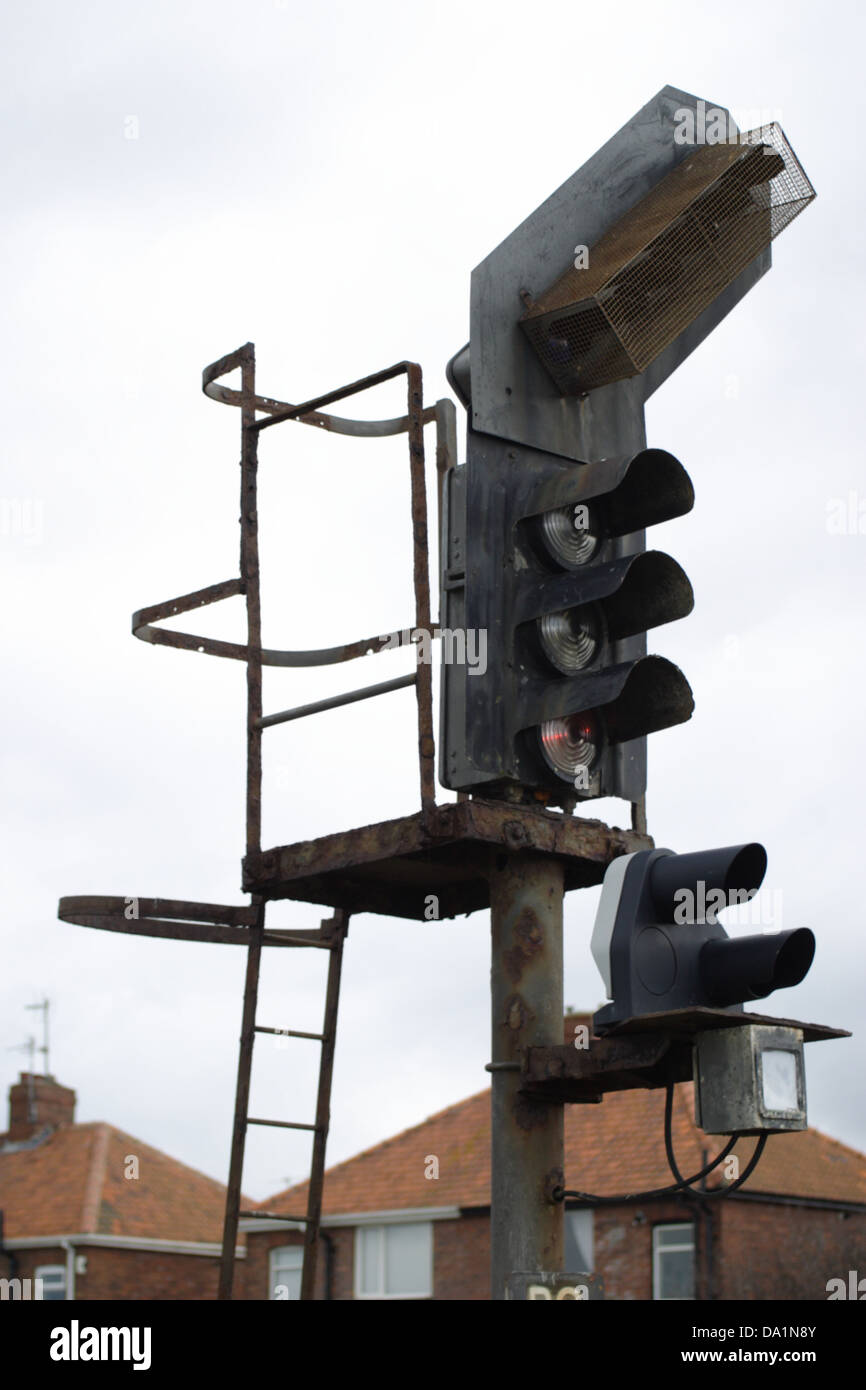 Old railway signals at the side of a railway line, set of traffic lights for trains. Stock Photo