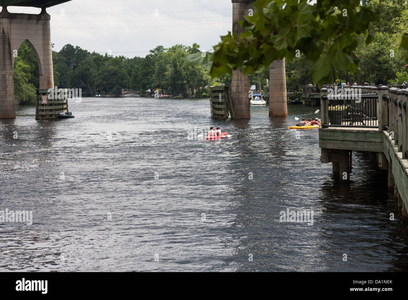 People Kayaking On The River Stock Photo