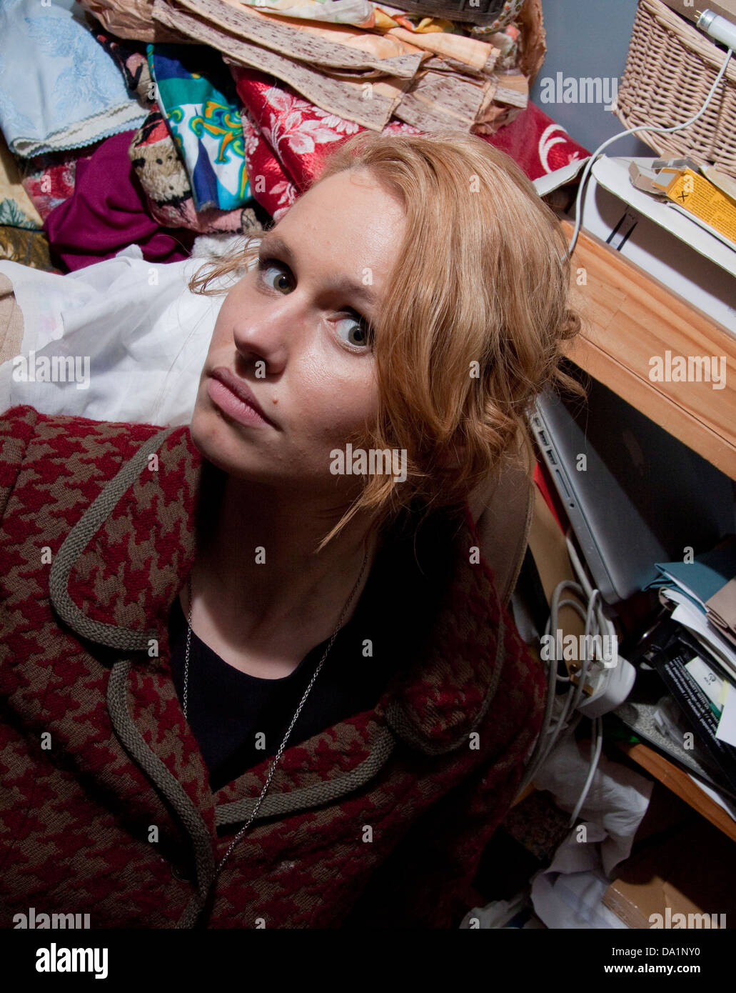 German singer songwriter KC McKanzie in the stock room of a pop up venue in London, England Stock Photo