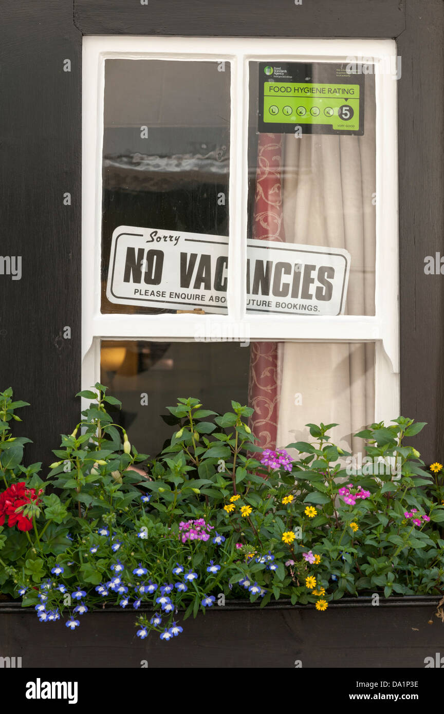 No vacancies sign in the window of the Golden Lion pub and hotel Padstow Cornwall UK Stock Photo