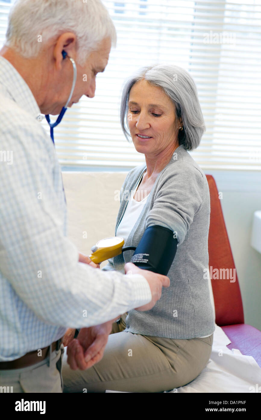 BLOOD PRESSURE, ELDERLY PERSON Stock Photo Alamy