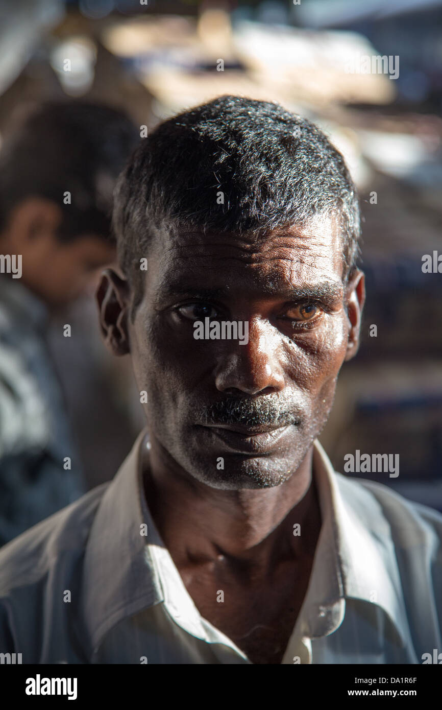 Indian man at Chattrapati Shivaji or Victoria Terminus, Mumbai, India Stock Photo