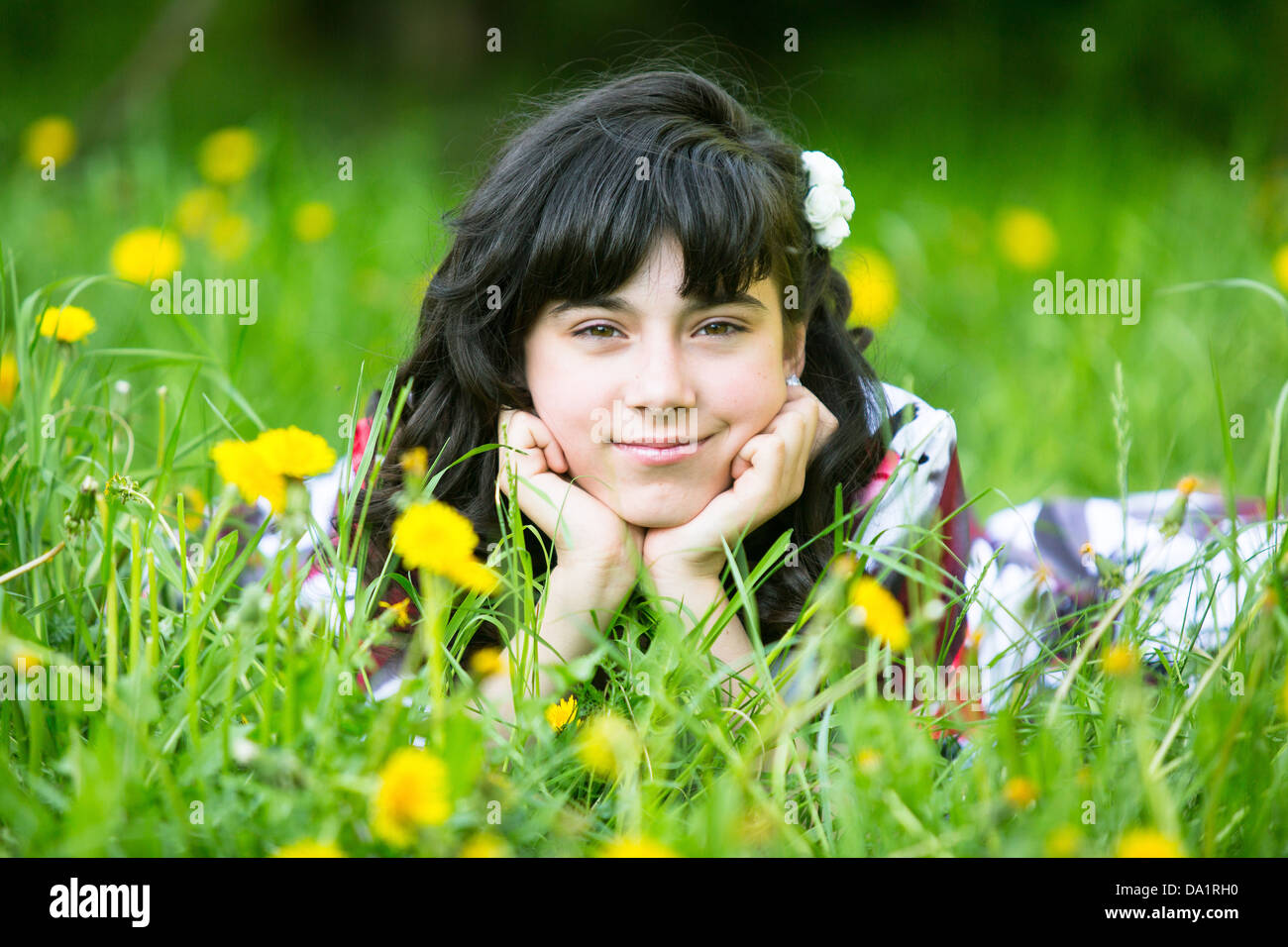 Portrait of a young pretty girl in the park Stock Photo - Alamy