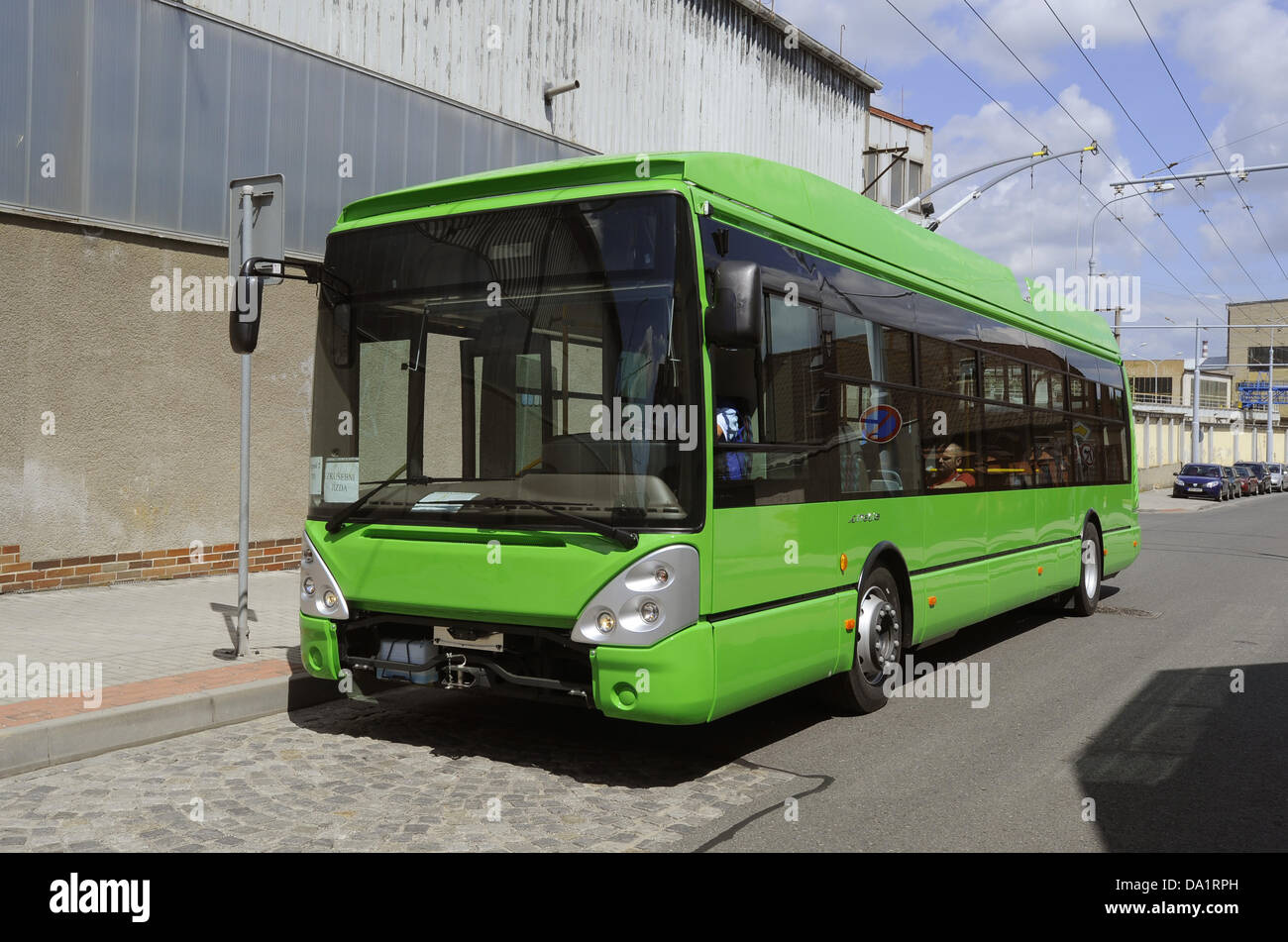 Skoda Electric, a subsidiary of Skoda Transportation, signed two major contracts for 130 trolley buses for 1.8 billion crowns. The Bulgarian capital Sofia will buy 50 buses for nearly 700 million crowns. Bratislava will buy 80 buses for 1.1 billion crowns. Pictured the new trolley during a test drive in the streets of Pilsen, Czech Republic, July 1, 2013. (CTK Photo/Petr Eret) Stock Photo