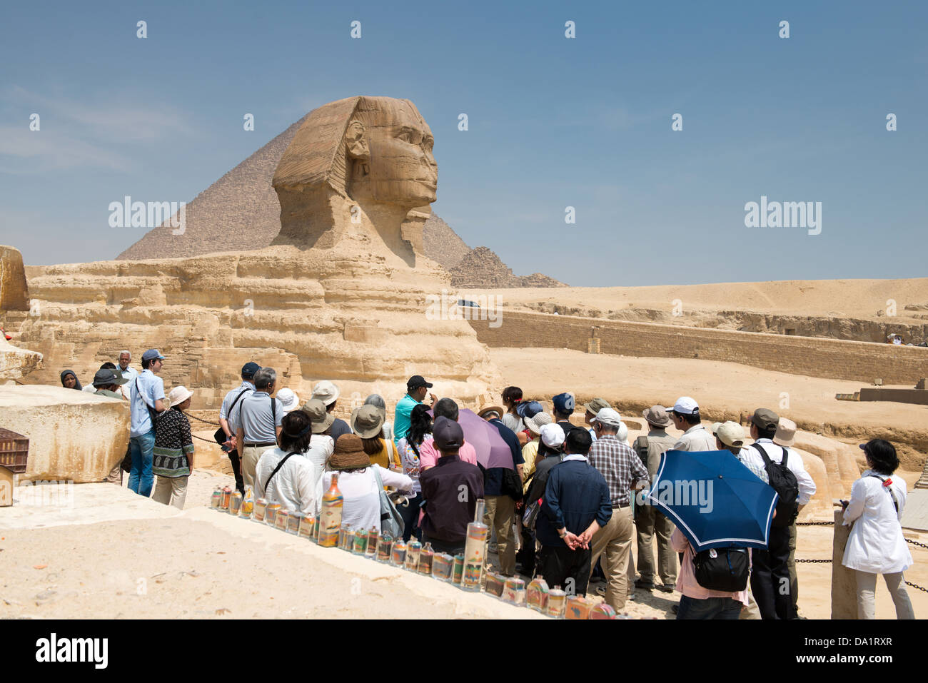Famous ancient statue of Sphinx in Giza, Egypt. Every day crowds of