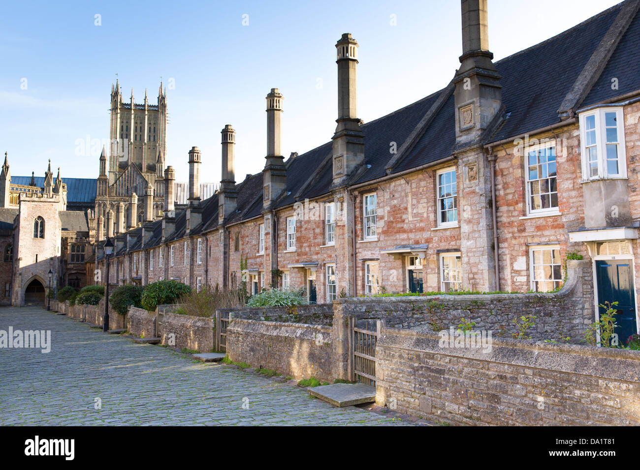 Vicars Close next to Wells Cathedral Somerset, England dating from the 15th century with Wells cathedral in the background Stock Photo