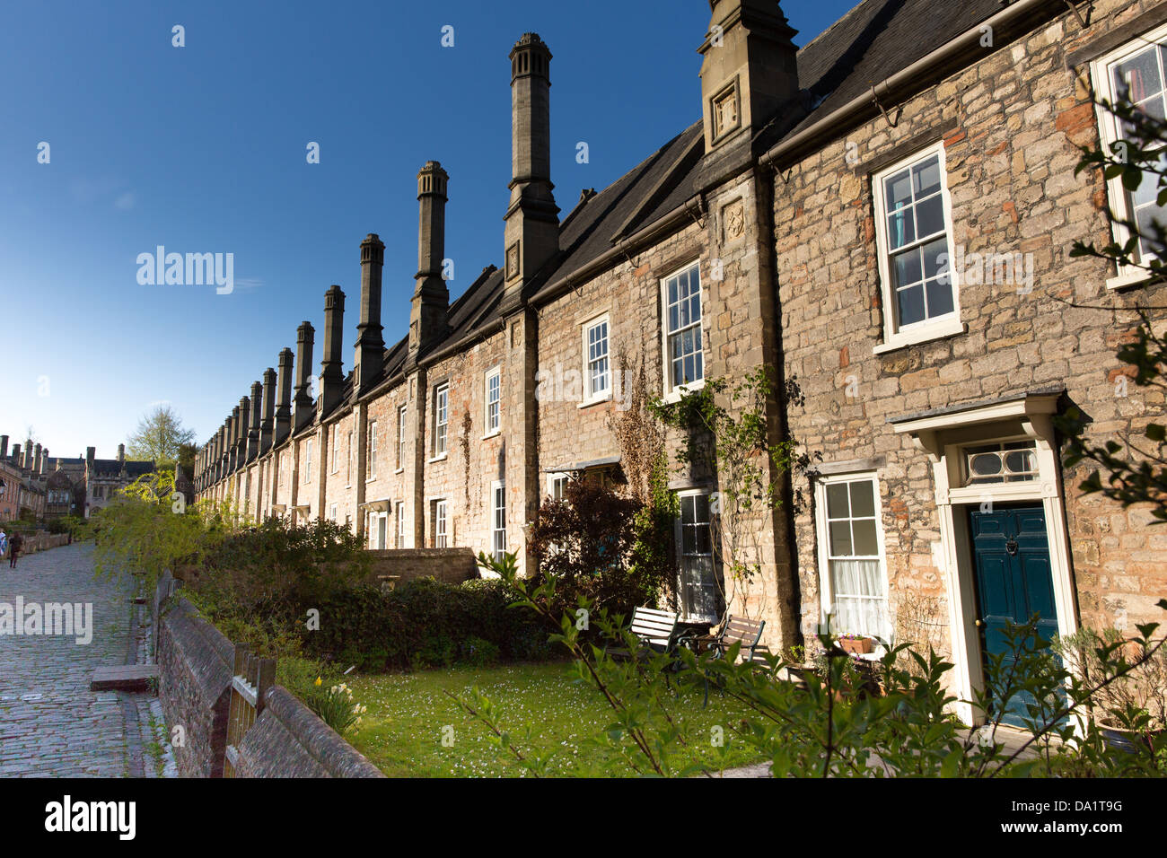 Vicars Close next to Wells Cathedral Somerset, England dating from the 15th century with Wells cathedral in the background Stock Photo