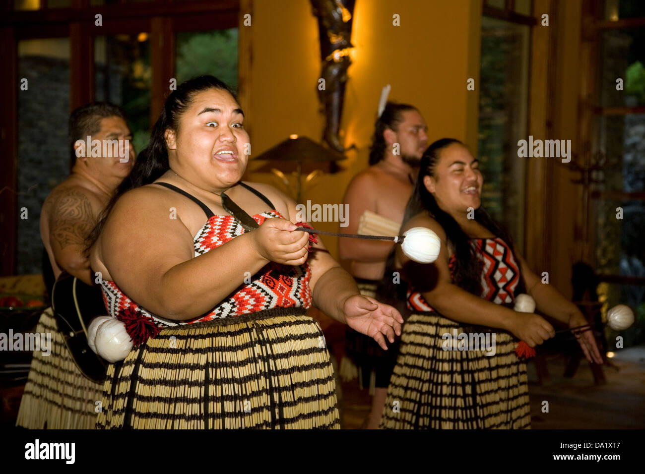 A Maori performance entertains guests at Treetops Lodge near Rotorua, New Zealand. Stock Photo