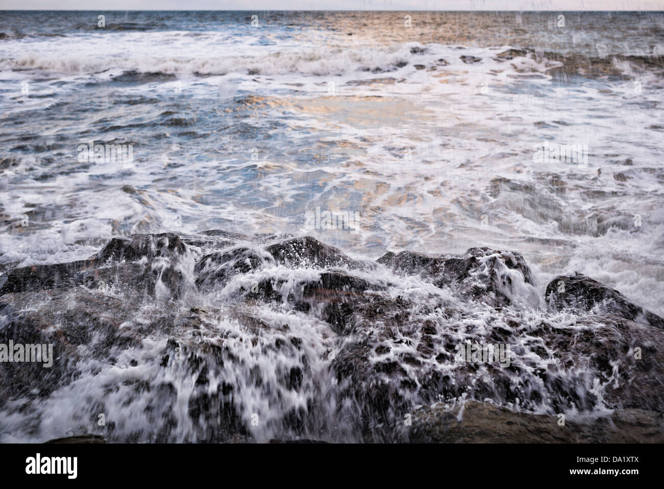 Waves on a rocky coast Stock Photo - Alamy