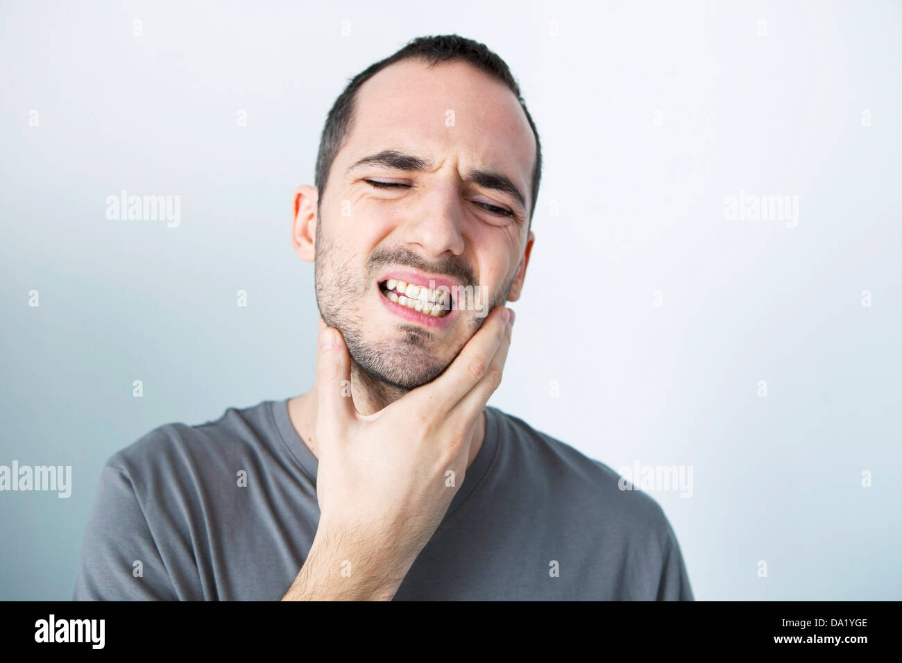 MAN WITH TOOTHACHE Stock Photo