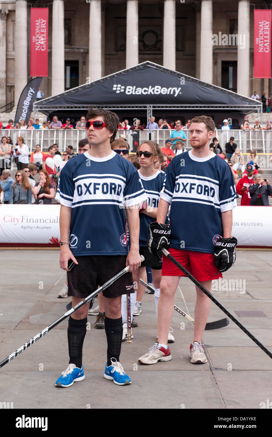 Trafalgar Square, London, UK. 1st July 2013. Canada Day 2013. Oxford Hockey team line up for the Canadian National Anthem. Credit:  Rena Pearl/Alamy Live News Stock Photo