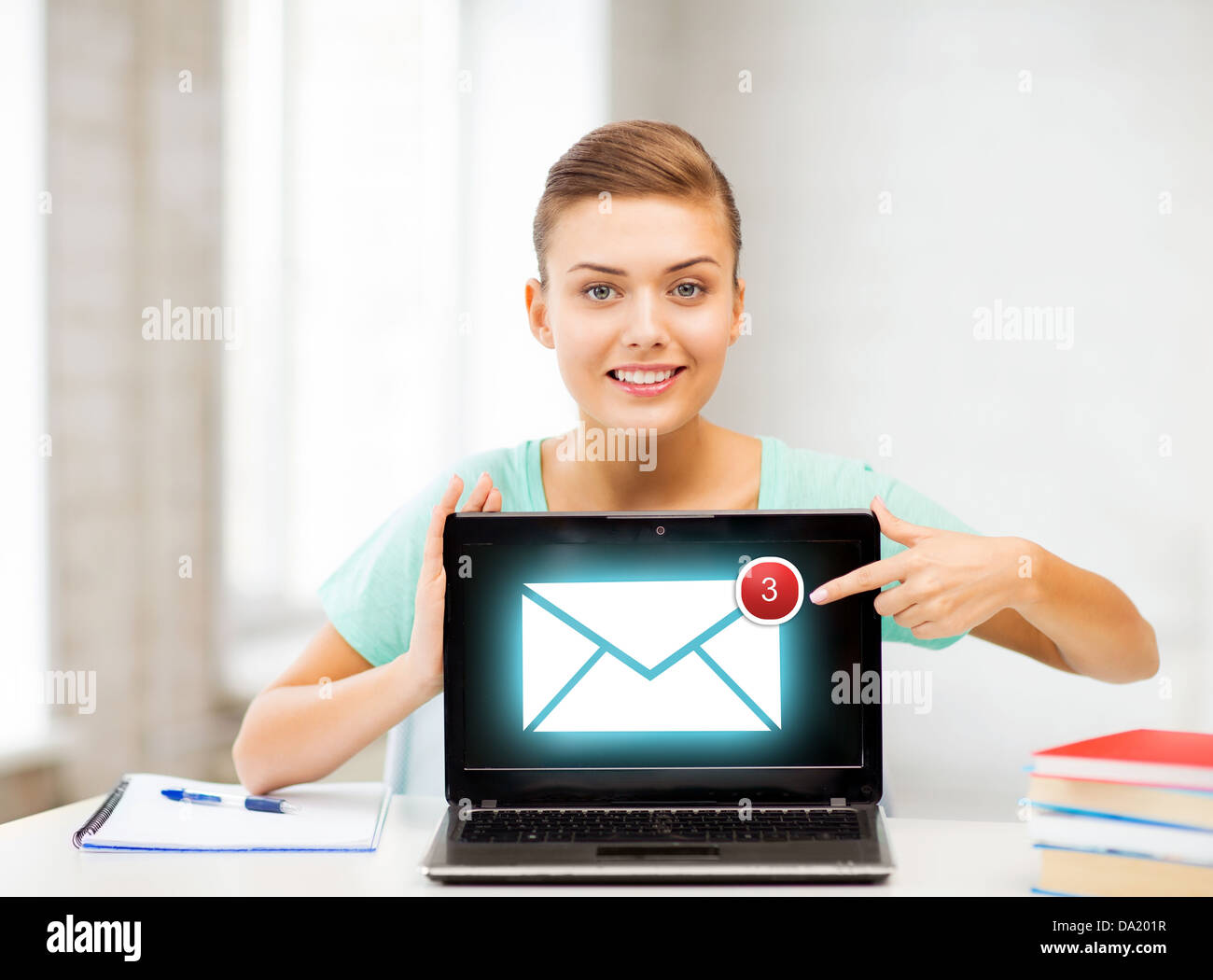smiling student girl with laptop at school Stock Photo - Alamy