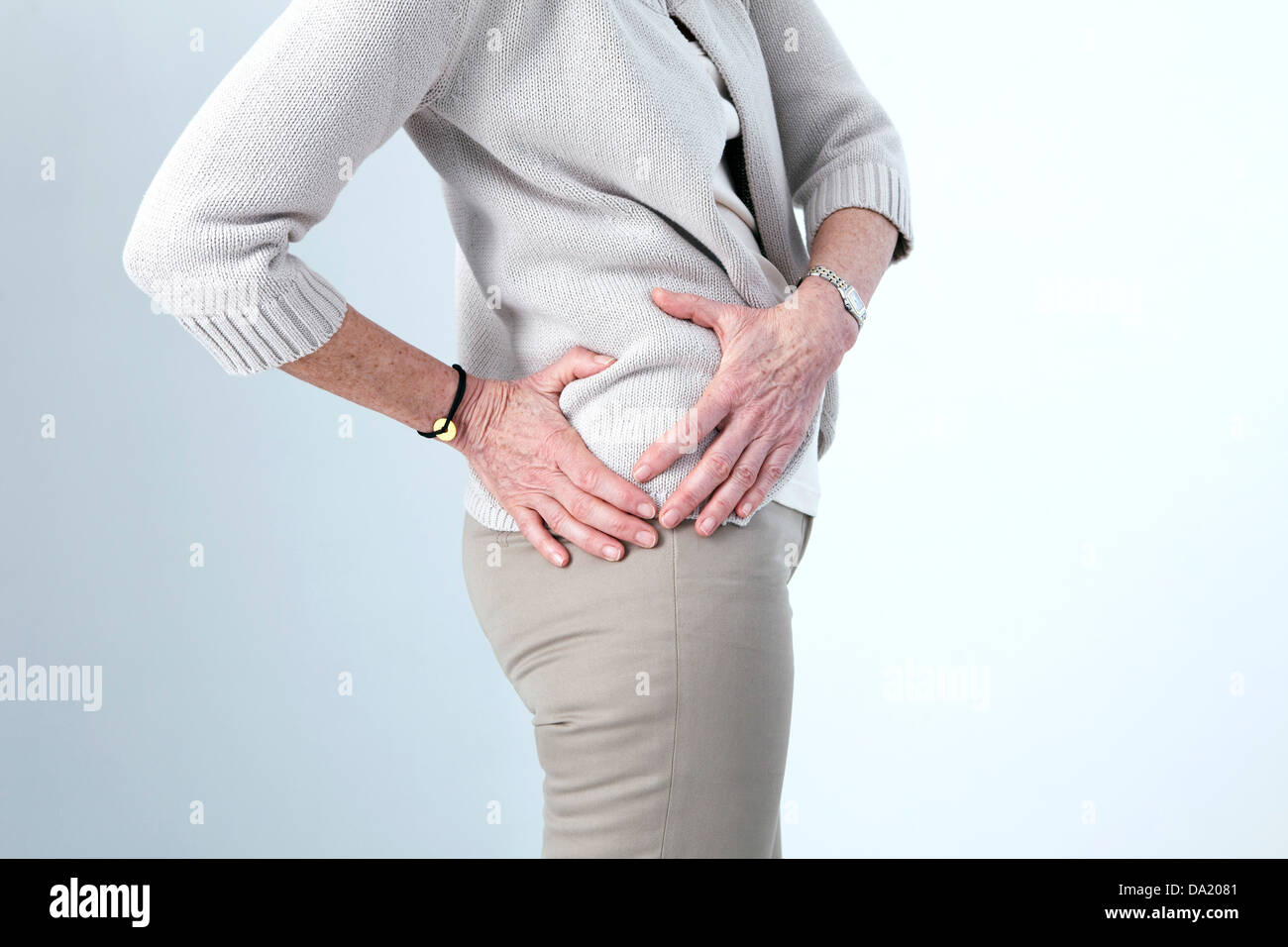 HIP PAIN IN AN ELDERLY PERSON Stock Photo - Alamy