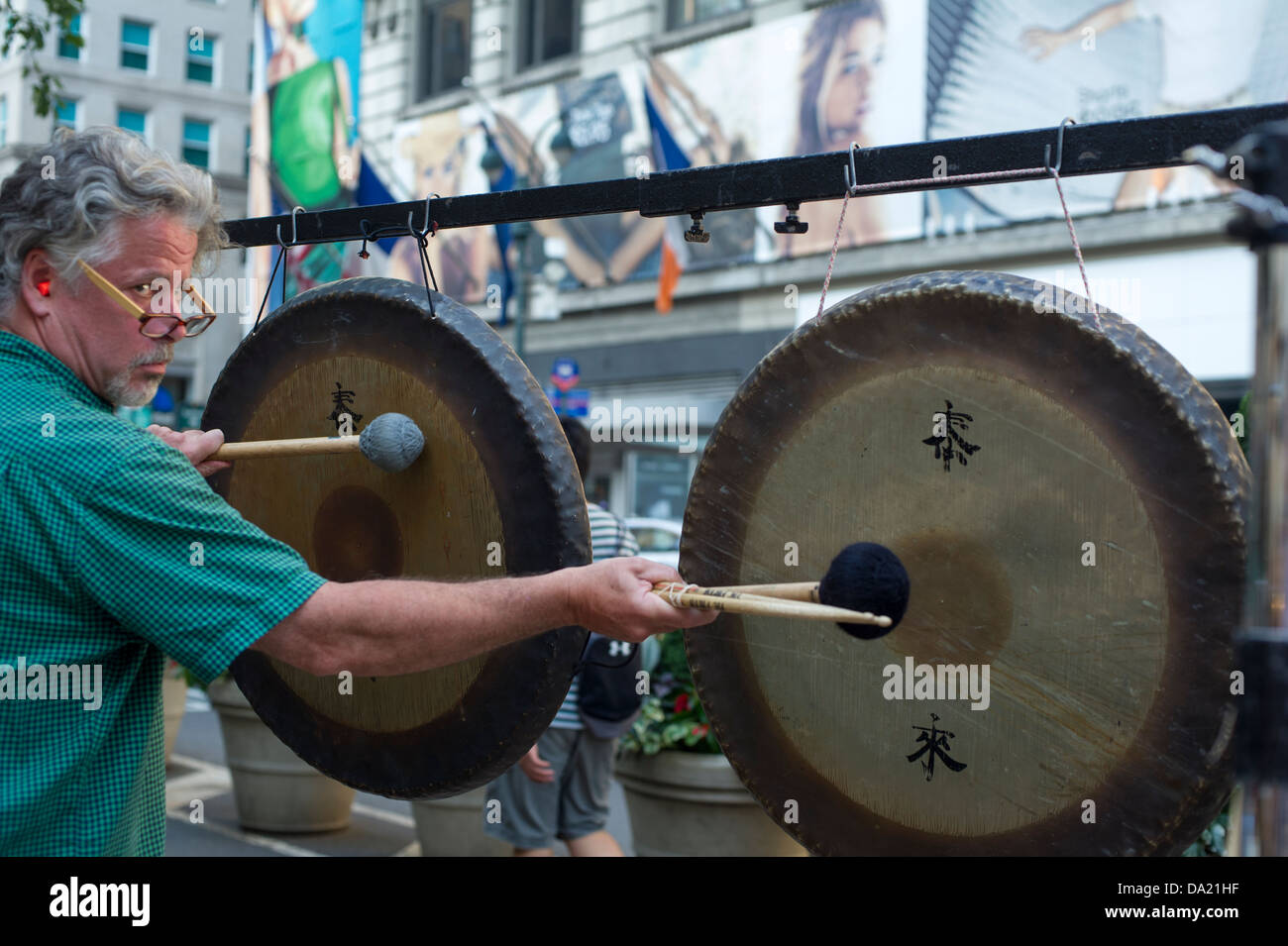 Gong players perform in Herald Square in New York as part of Mass Appeal  during the Make Music New York Festival Stock Photo - Alamy