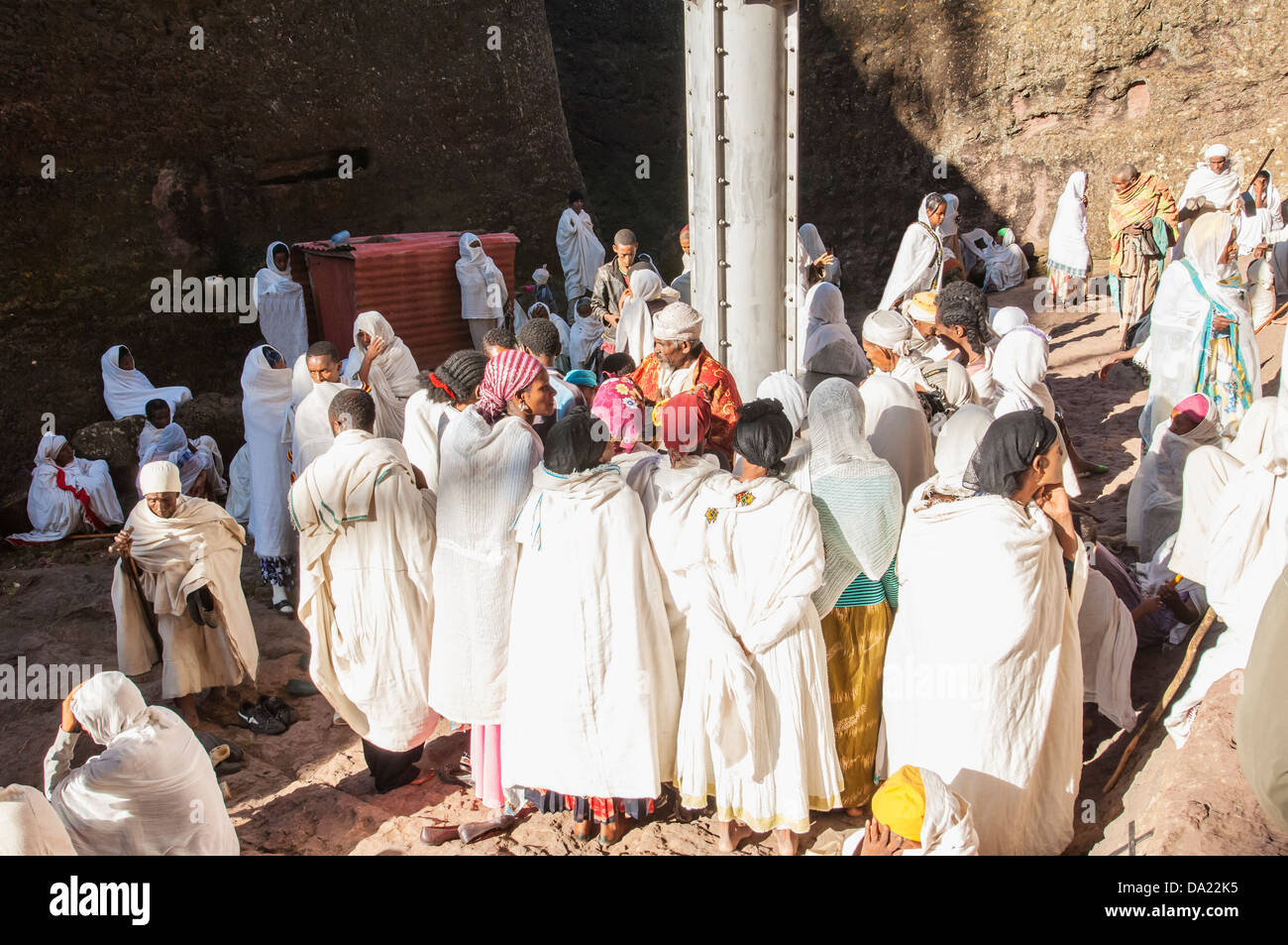 Pilgrims with the traditional white shawl attending a ceremony at the Bete Medhane Alem Church, Lalibela, Ethiopia Stock Photo