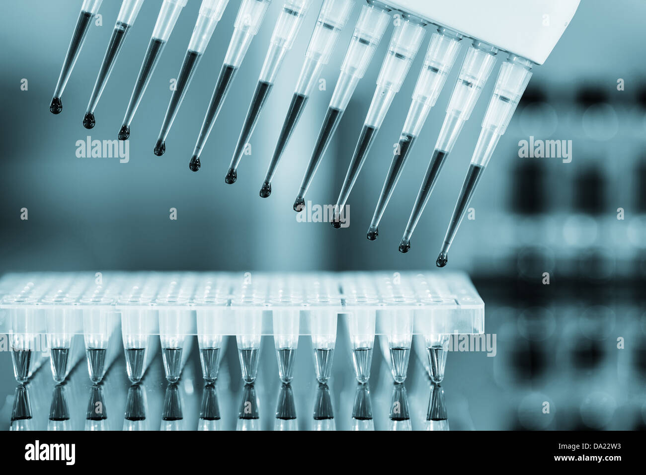 multipipette and sample tray biotech concept Stock Photo