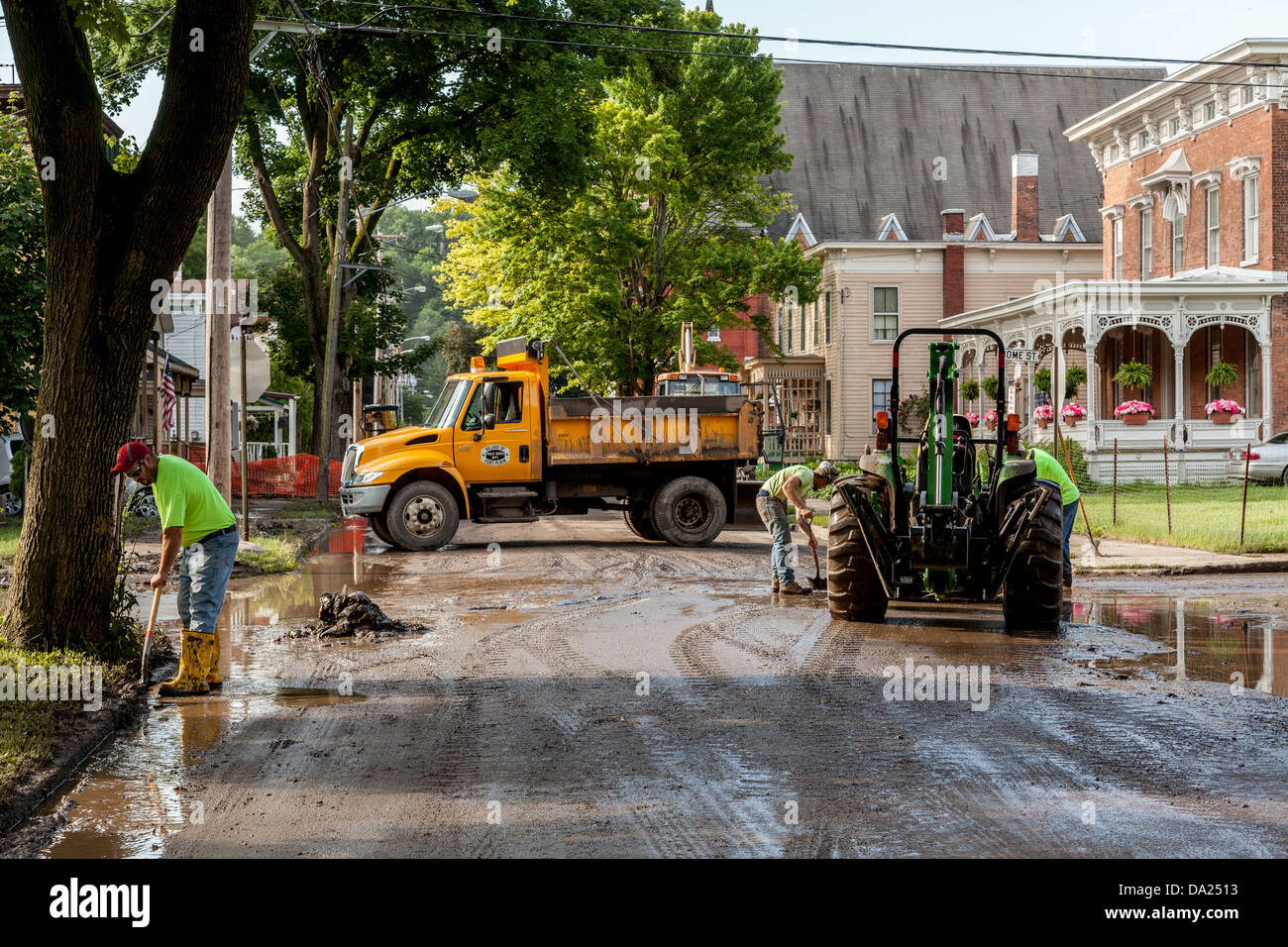Cleaning up mud after a flash flood, Fort Plain, New York, Mohawk Valley Stock Photo