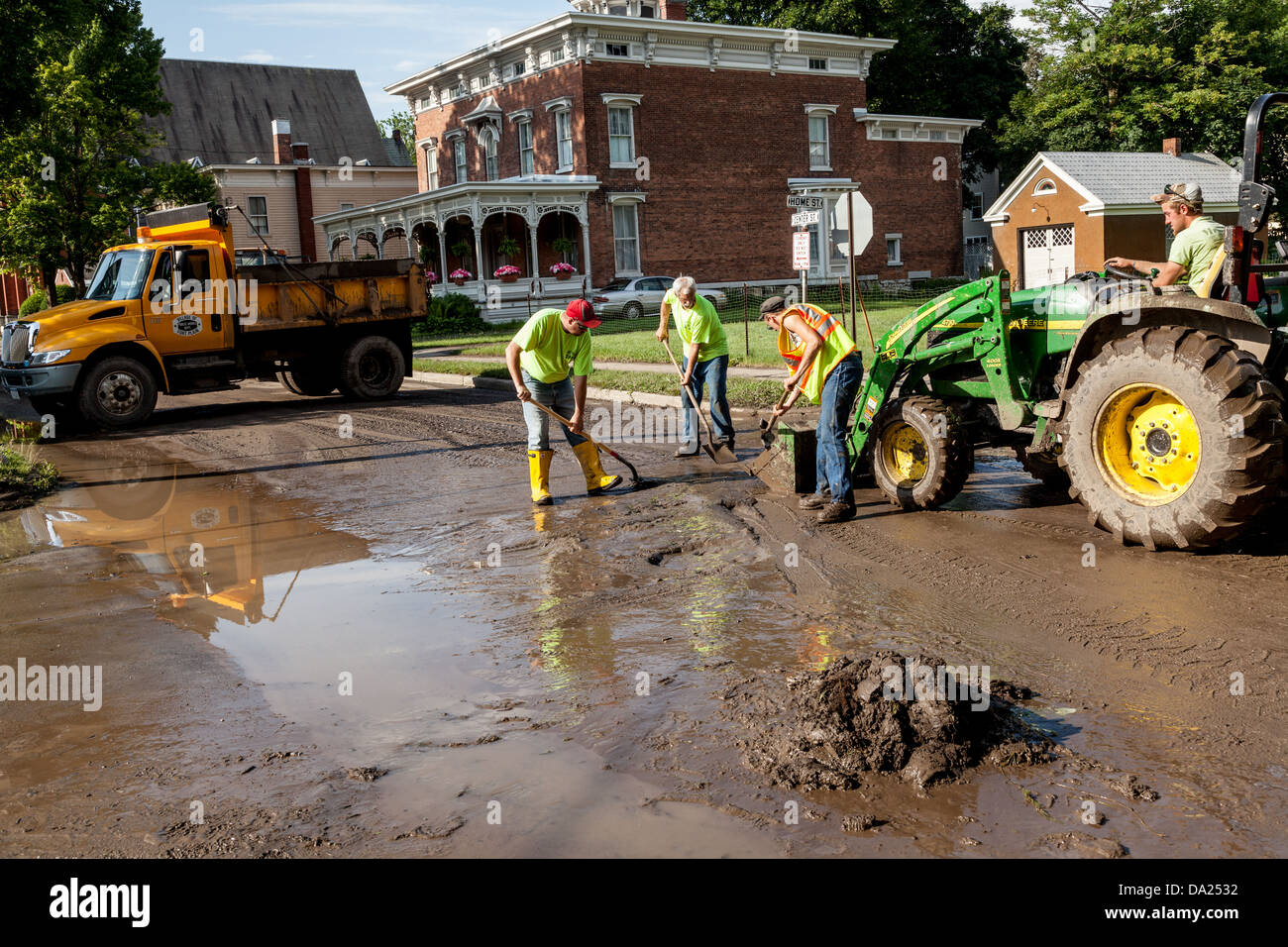 Cleaning up mud after a flash flood, Fort Plain, New York, Mohawk Valley Stock Photo