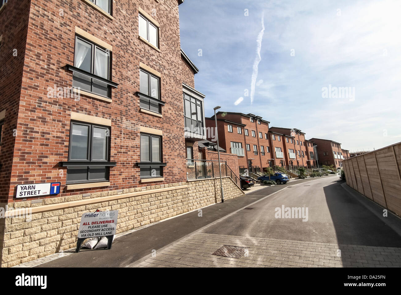 New housing development by the river in Leeds Stock Photo Alamy