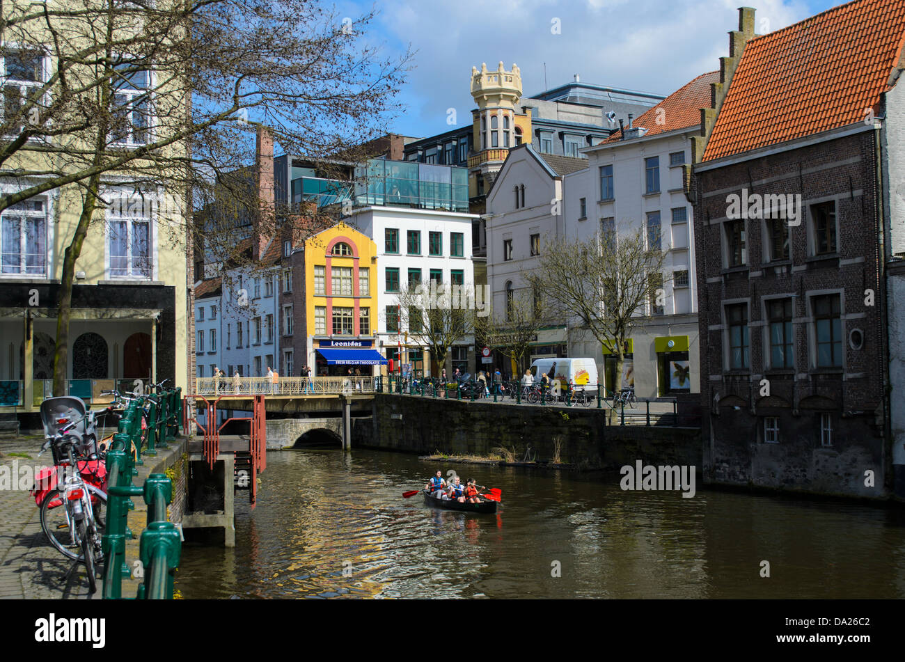 canal and apartments in Ghent and canoing on canal Stock Photo Alamy