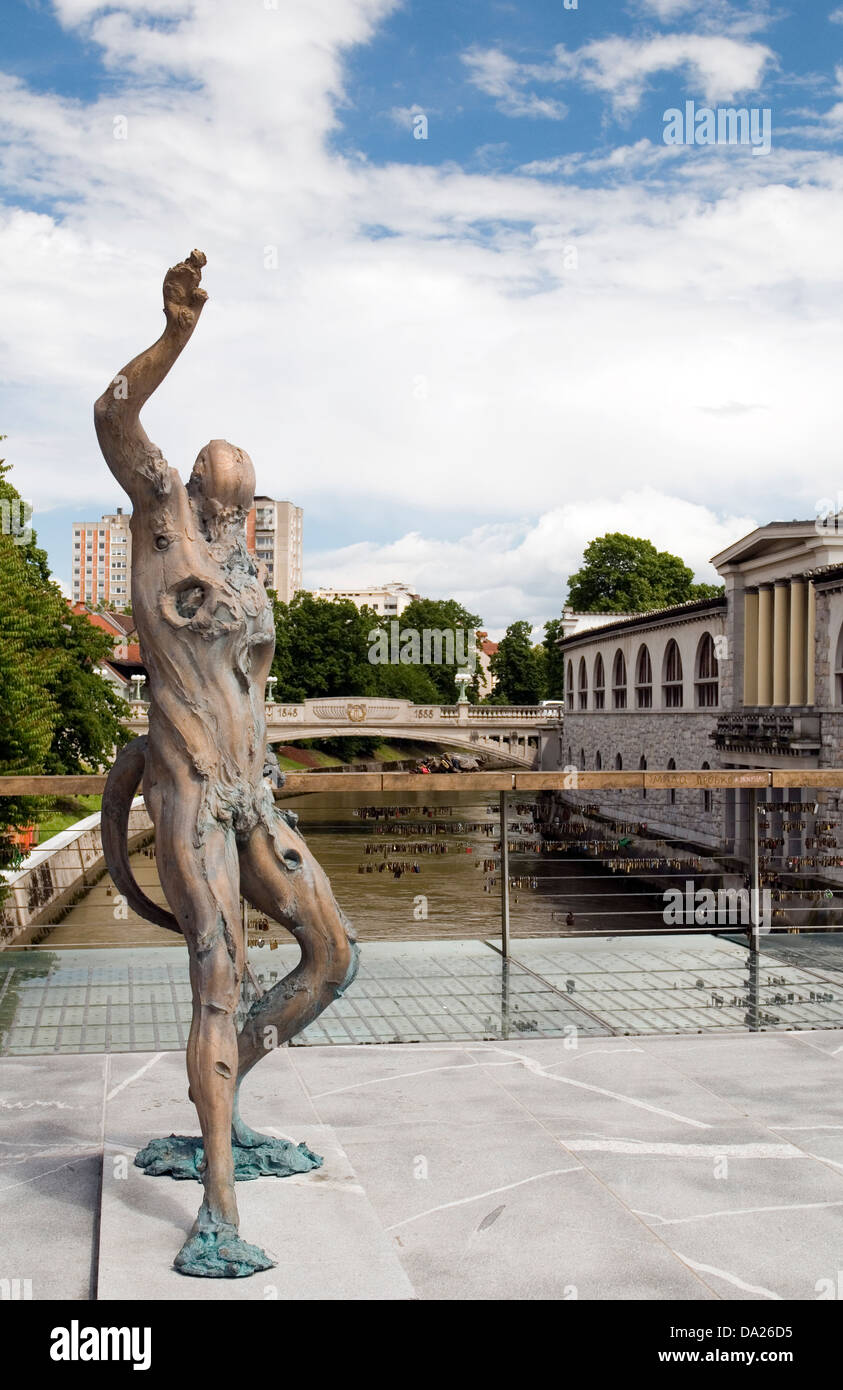 statue of Prometheus on Butcher's Bridge with padlocks Ljubljanica River Ljubljana Slovenia Europe Stock Photo