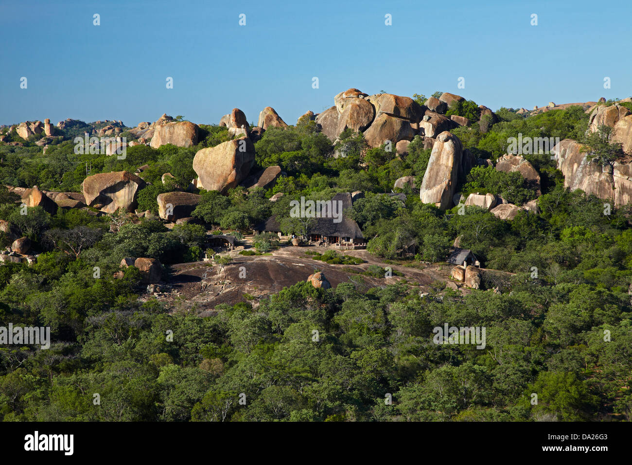 Big Cave Camp, blending in to the granite outcrops of the Matopos Hills, near Bulawayo, Zimbabwe, Southern Africa Stock Photo