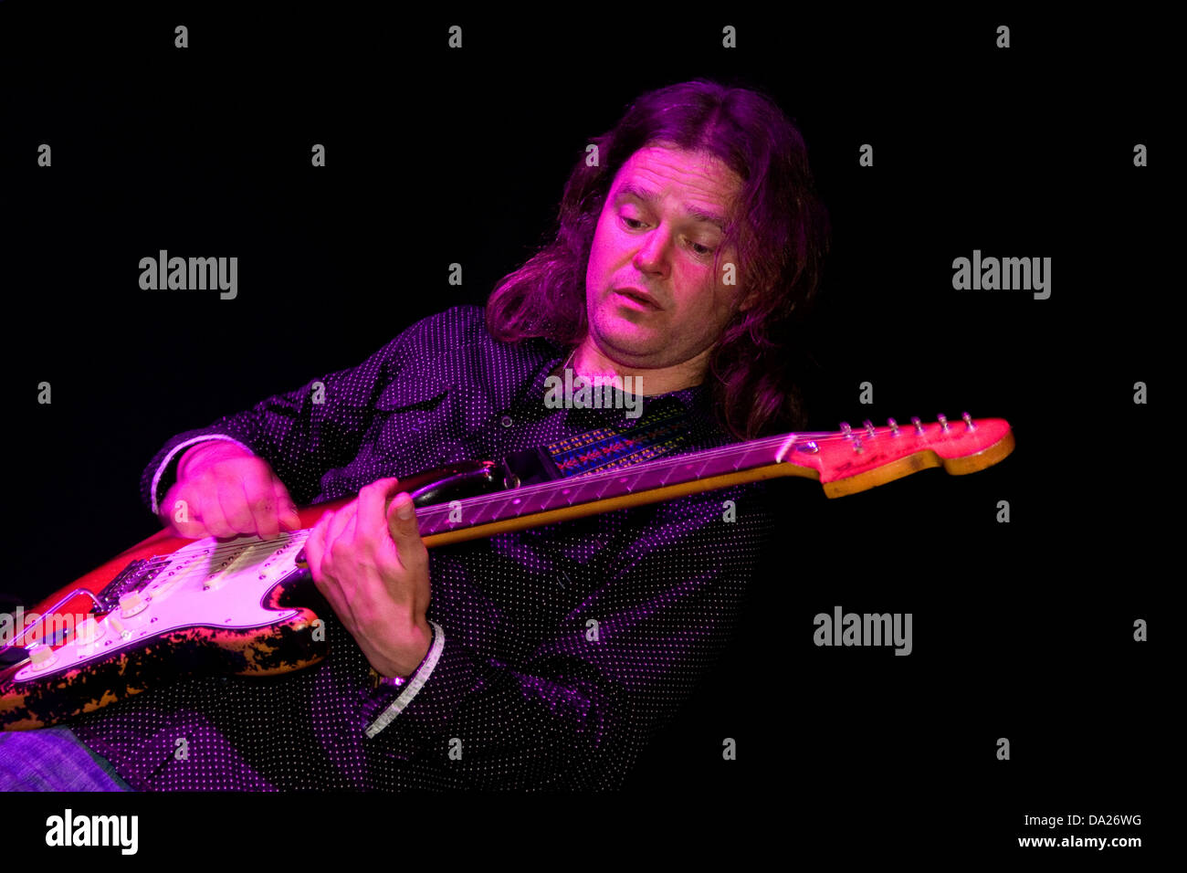 Lee Wharton playing the Fender Stratocaster during a live performance at Duke`s Corner in Dundee,UK Stock Photo