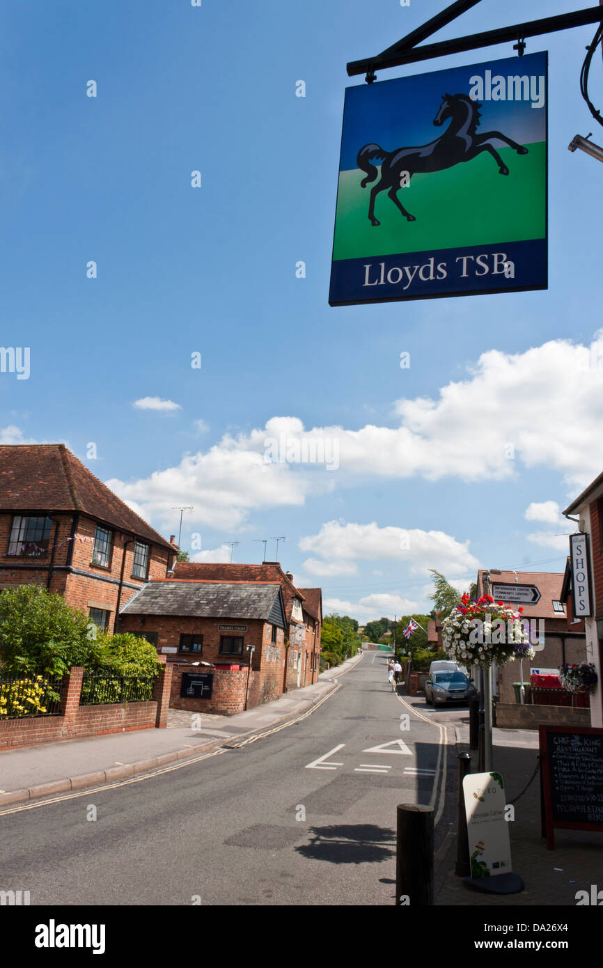 UK village high street - banking group Lloyds TSB sign above bank with iconic black prancing horse. Stock Photo