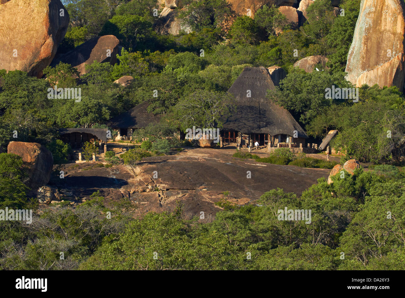 Big Cave Camp, blending in to the granite outcrops of the Matopos Hills, near Bulawayo, Zimbabwe, Southern Africa Stock Photo