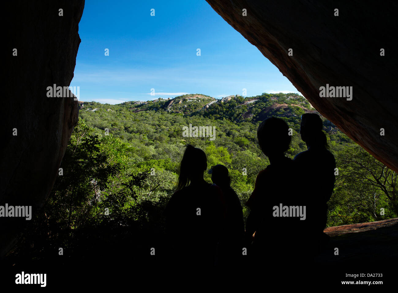 Hikers in Big Cave, Big Cave Camp, Matopos Hills, near Bulawayo, Zimbabwe, Southern Africa Stock Photo