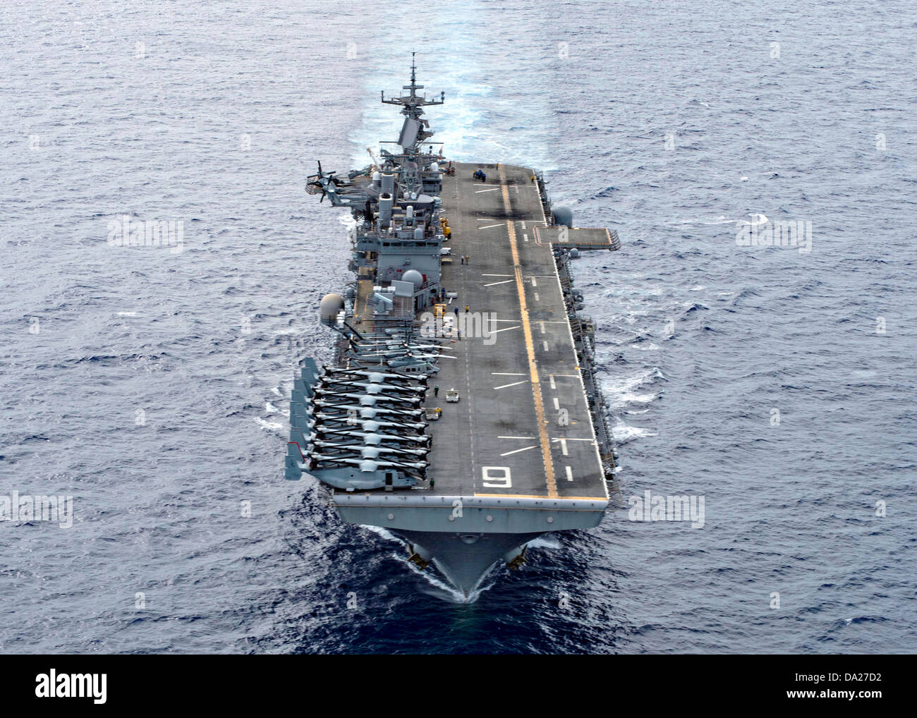 US Navy amphibious assault ship USS Bonhomme Richard July 1, 2013 as it transits the Phillippine Sea. Stock Photo