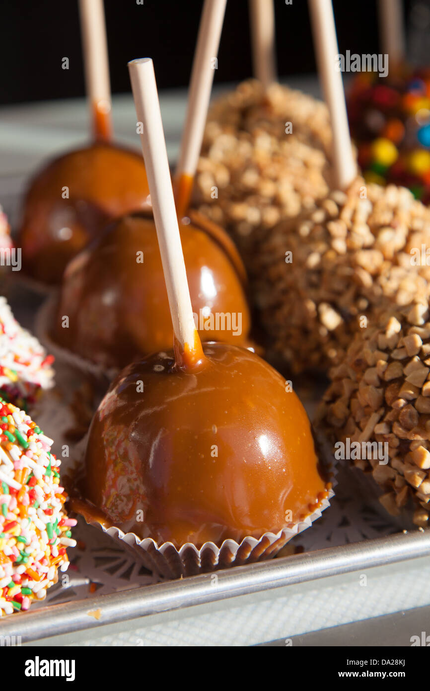 Tray full of caramel and candied apples. shallow depth of field Stock Photo