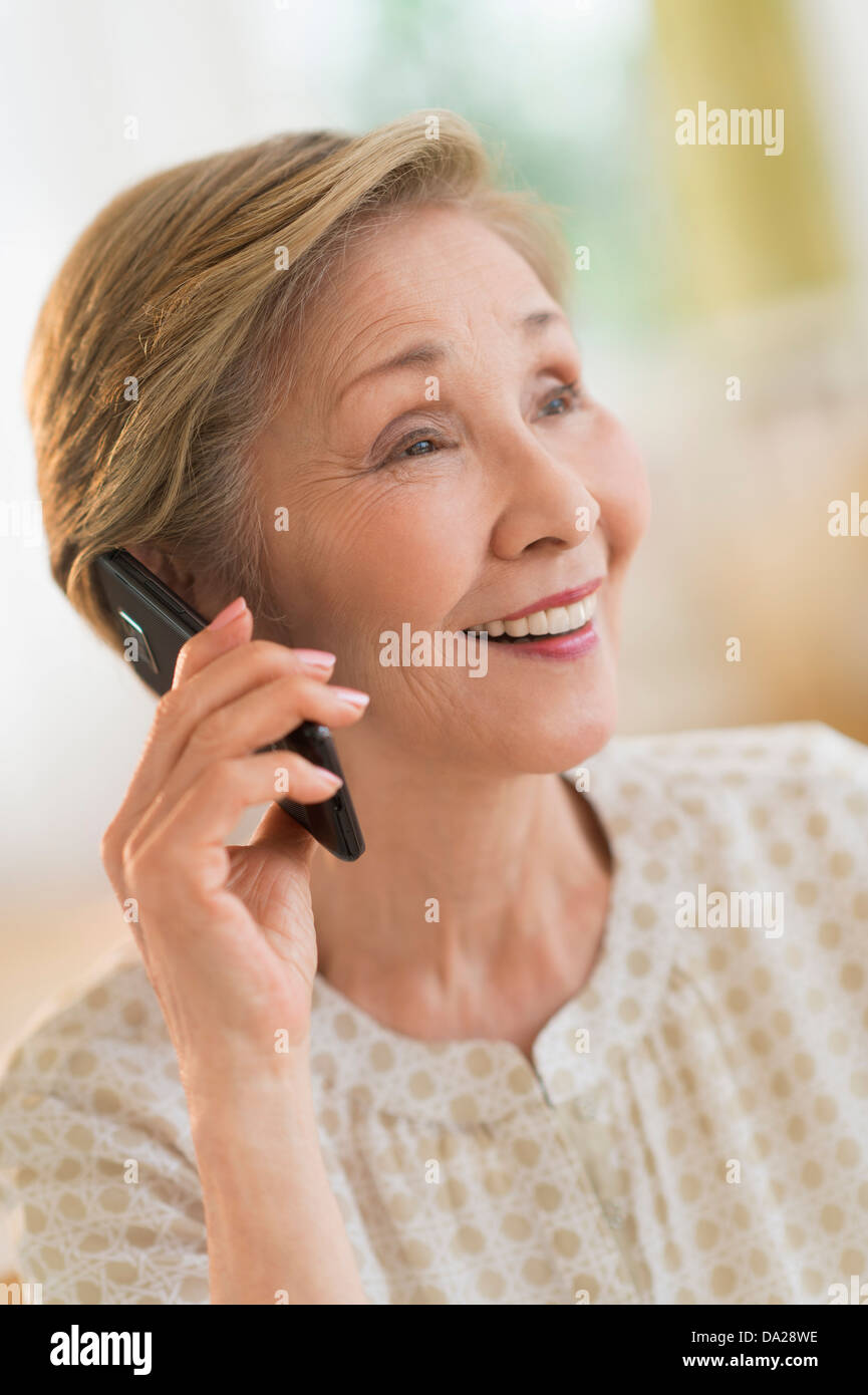 Senior woman talking on phone Stock Photo - Alamy