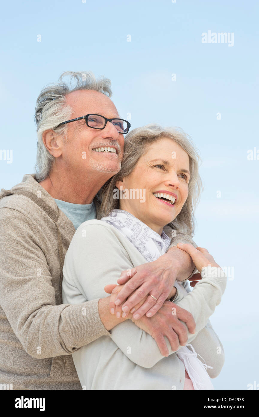 Senior couple embracing outdoors Stock Photo
