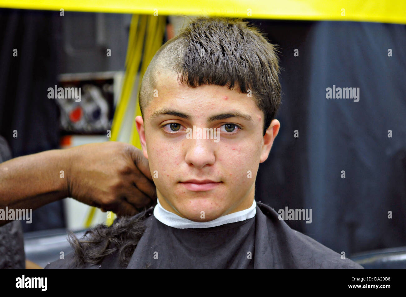 US Naval Academy freshmen known as Plebes have their hair cut