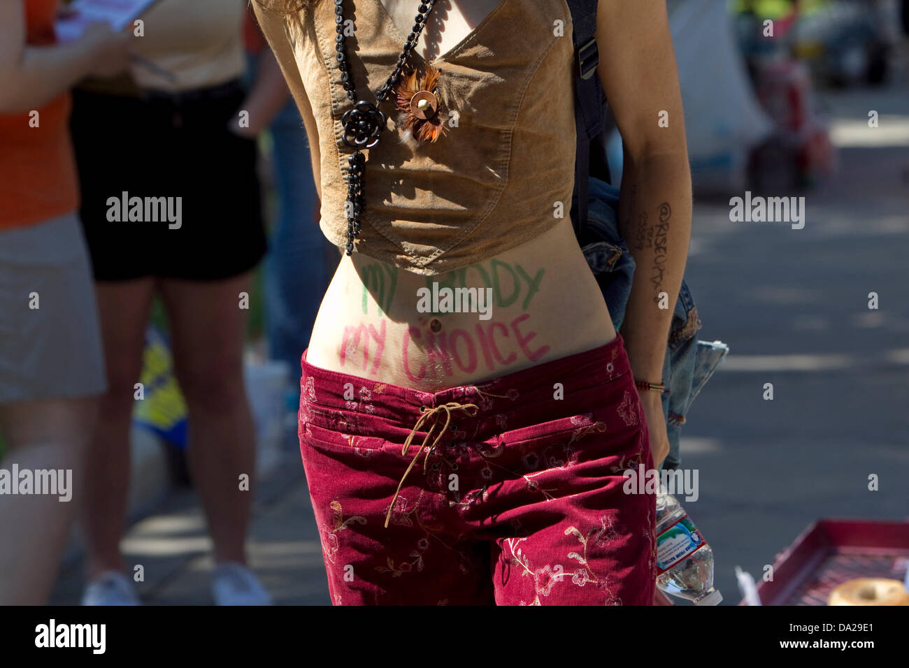 Pro-choice activist has 'My Body My Choice' slogan painted on her body at a rally at Texas Capital protesting new law relating to abortion restrictions Stock Photo