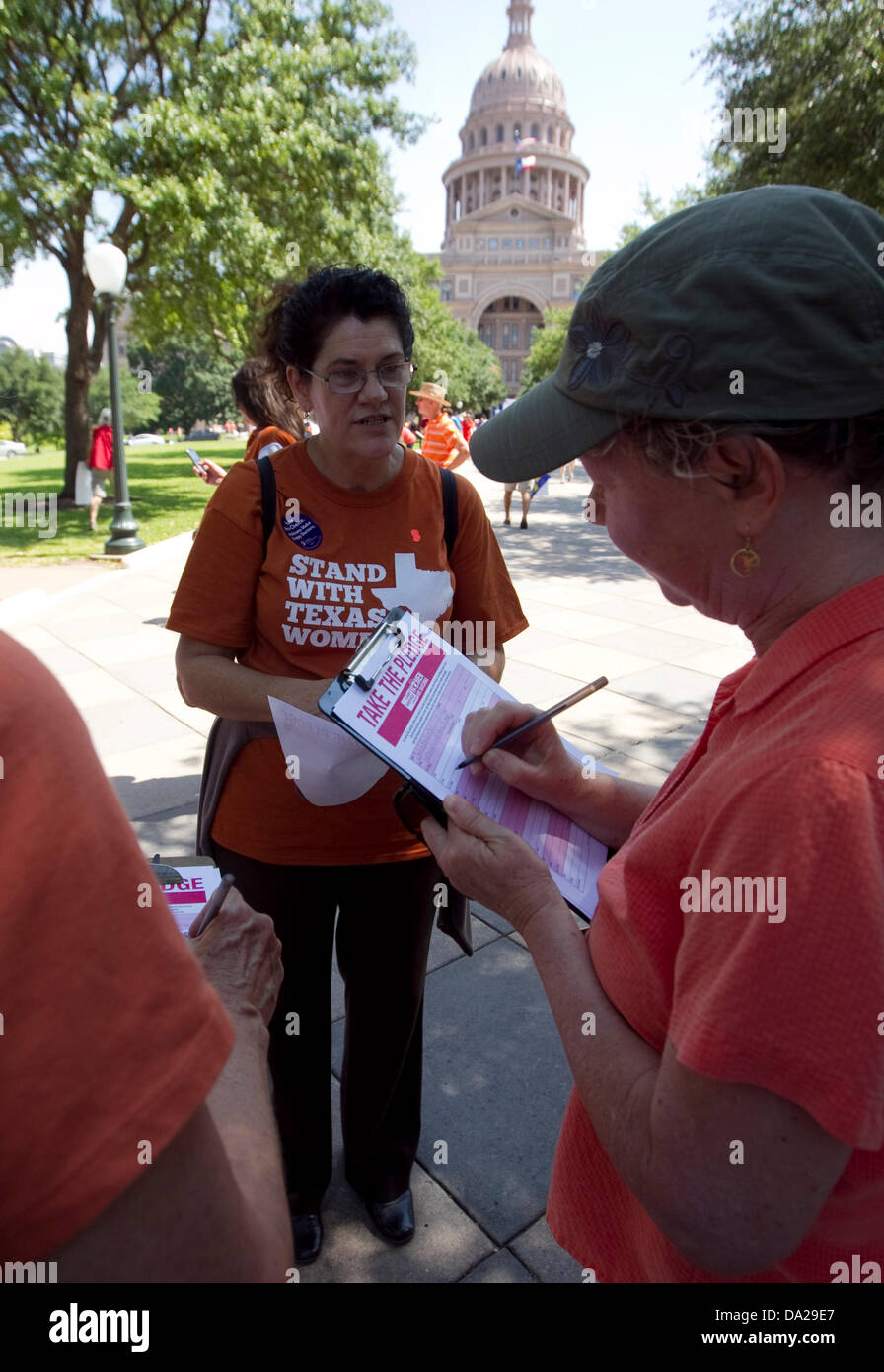 Pro-choice activists arrive at a rally at Texas Capital protesting new law relating to abortion restrictions Stock Photo