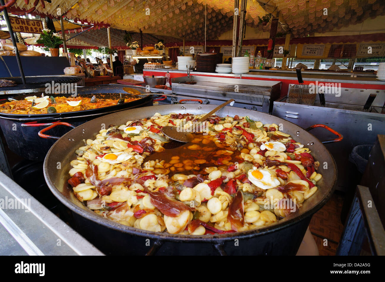 A large frying pan con tapas Spanish dish made potato in fairground